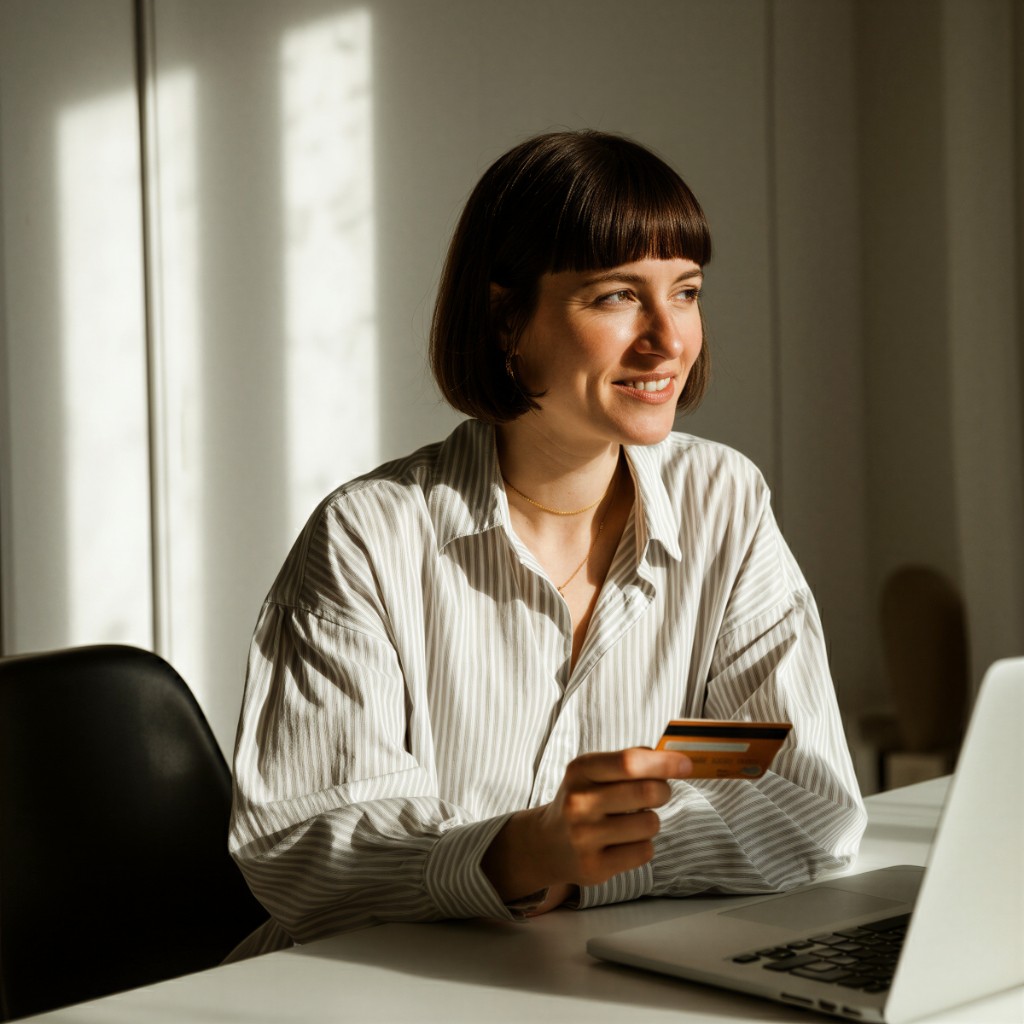 Professional managing online payments from a laptop